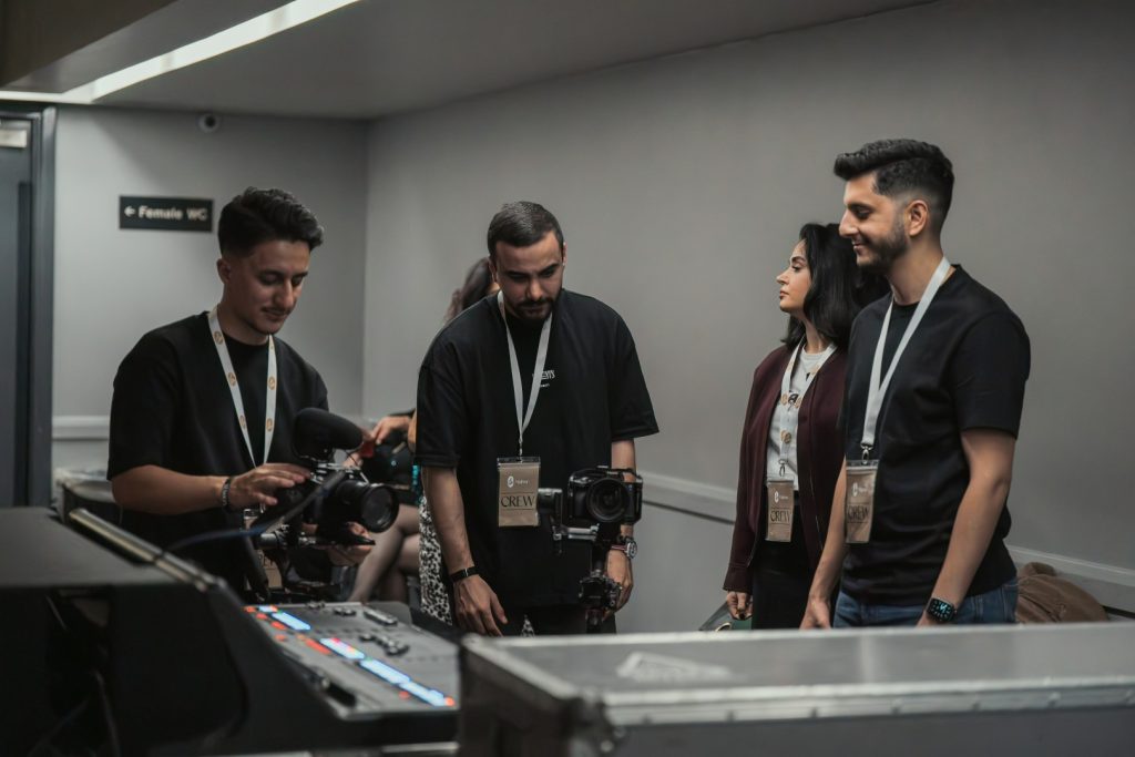 The Minutes Agency team filming together at an event in Manchester