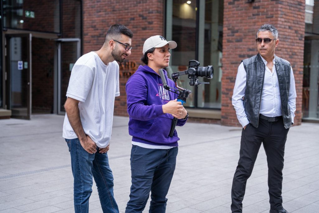 Two Minutes Agency crew members filming on location